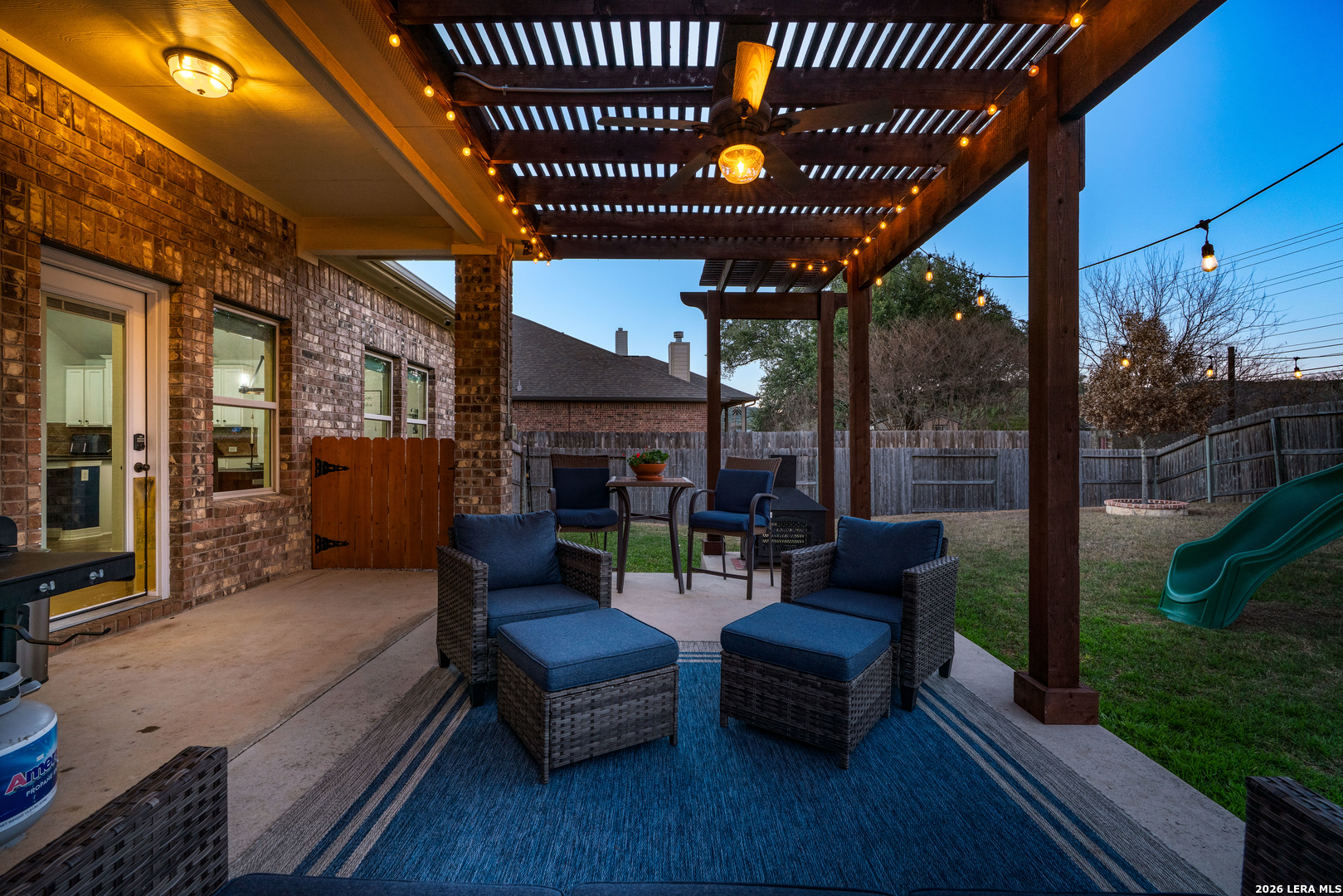 11331 Massive Mount Helotes, TX 78023 - Photo 40 of 43 a outdoor living space with patio furniture and wooden floor