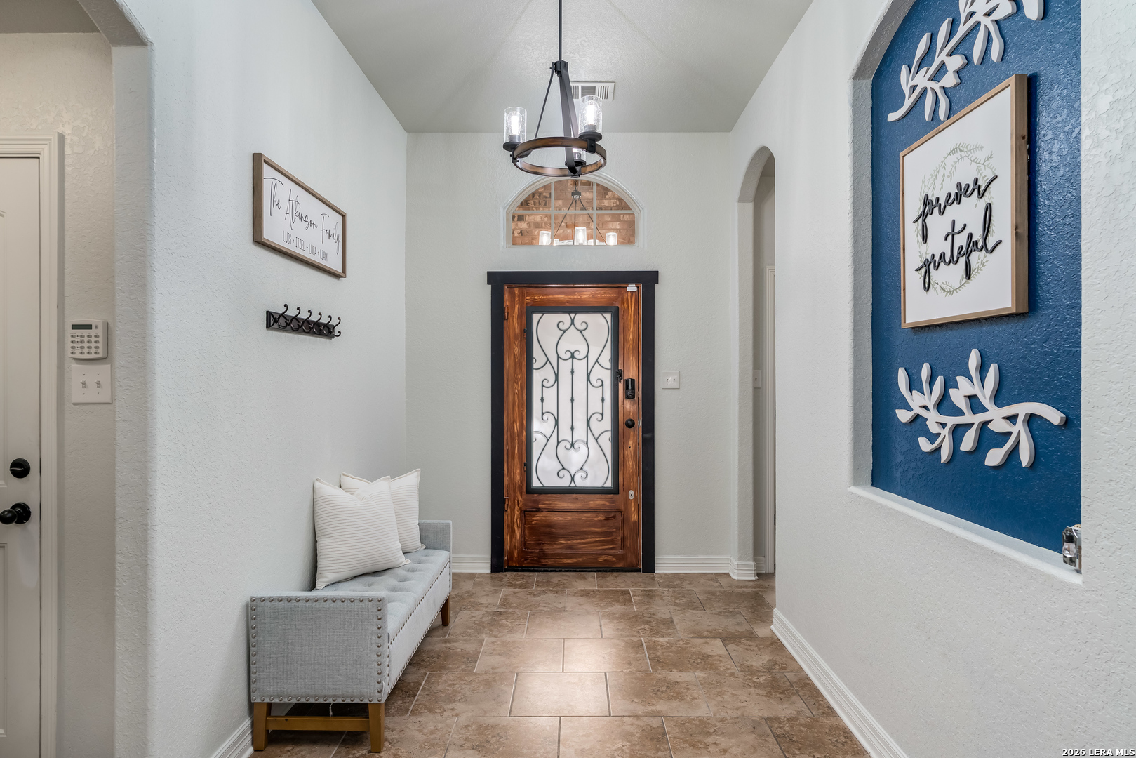 11331 Massive Mount Helotes, TX 78023 - Photo 4 of 43 a front view of a house with entryway