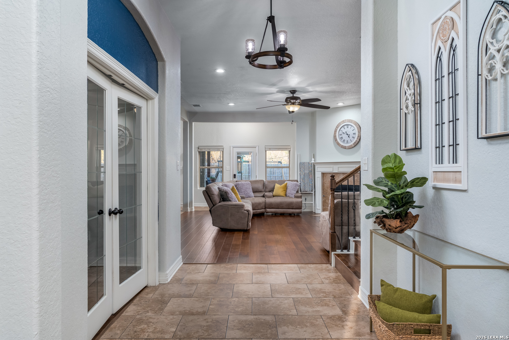 11331 Massive Mount Helotes, TX 78023 - Photo 5 of 43 a living room with patio furniture and a chandelier