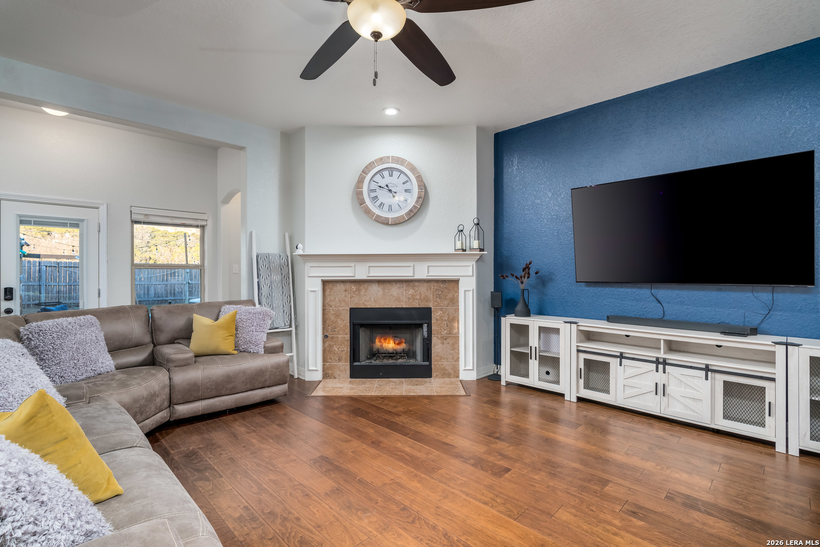 11331 Massive Mount Helotes, TX 78023 - Photo 6 of 43 a living room with furniture and a flat screen tv