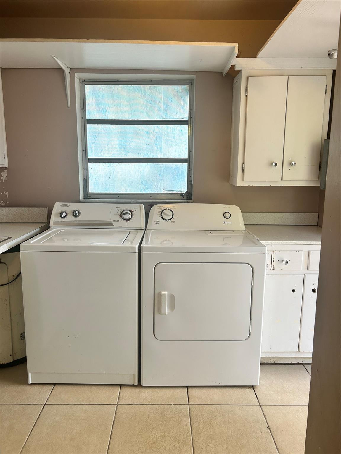 244 Southwest 3rd Place Dania Beach, FL 33004 - Photo 16 of 42 a utility room with dryer and washer