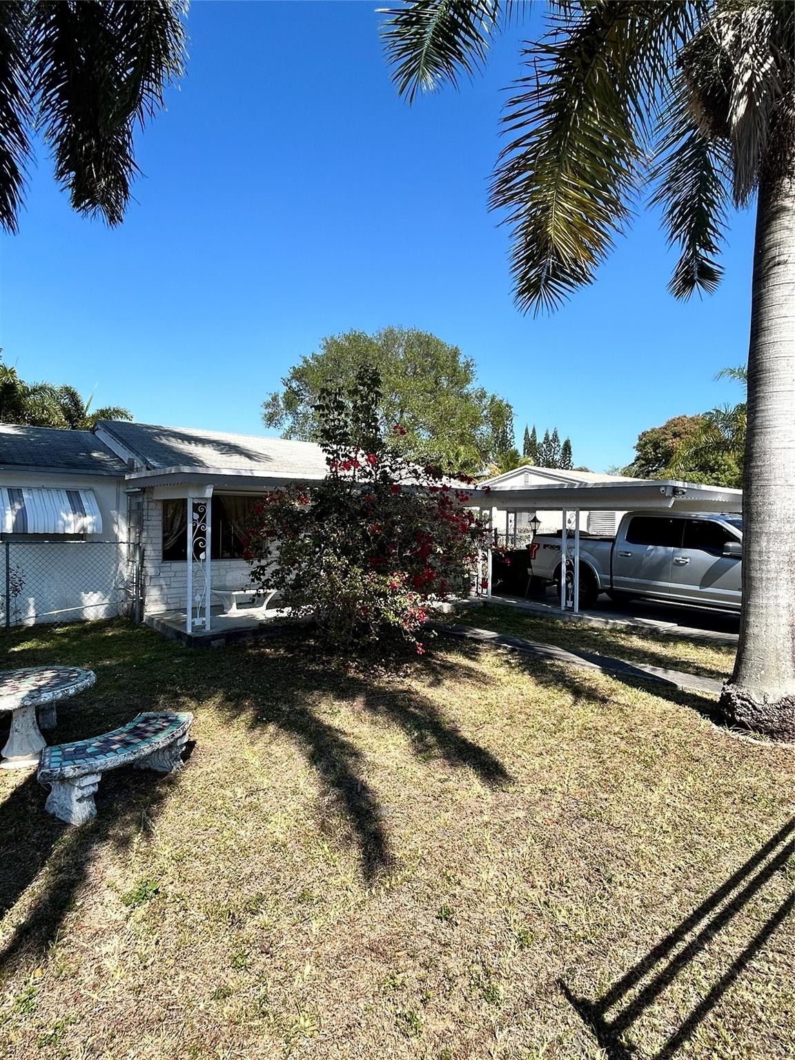244 Southwest 3rd Place Dania Beach, FL 33004 - Photo 2 of 42 a view of a house with swimming pool and sitting area