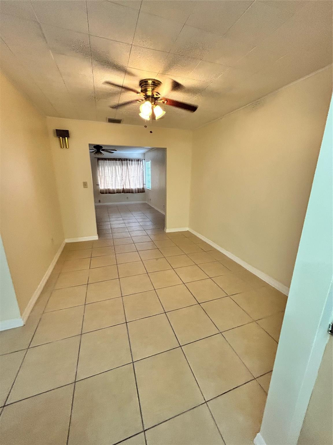 244 Southwest 3rd Place Dania Beach, FL 33004 - Photo 21 of 42 a view of an empty room with a window