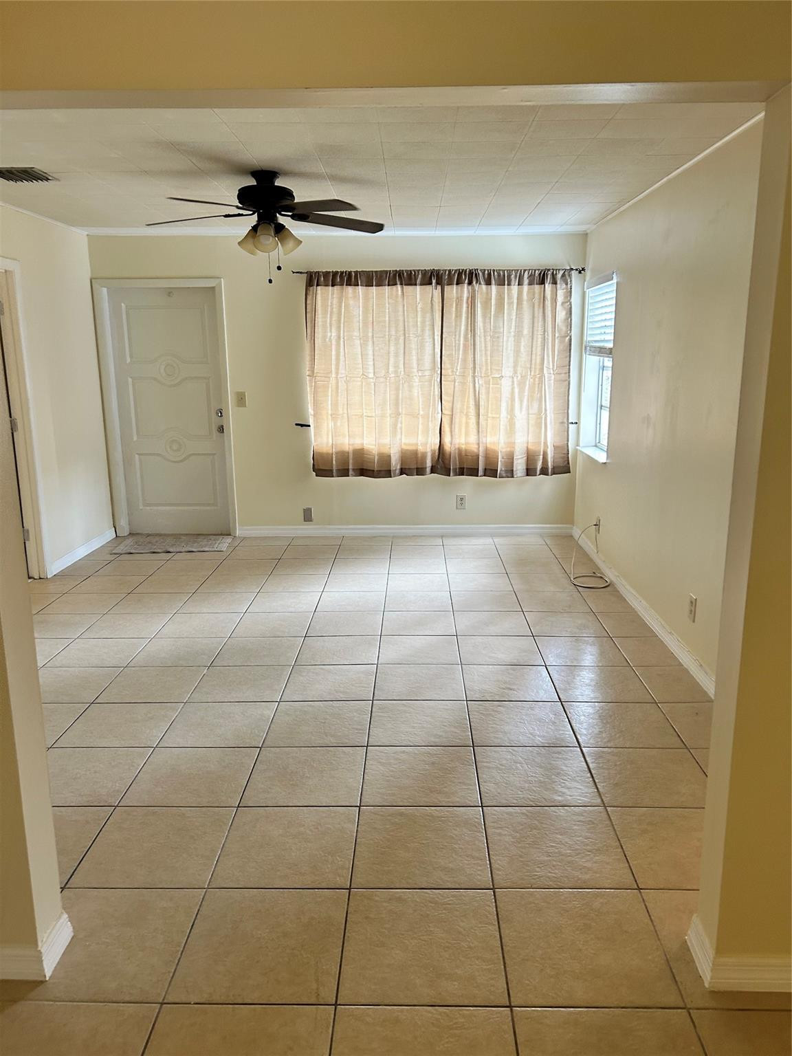 244 Southwest 3rd Place Dania Beach, FL 33004 - Photo 24 of 42 a view of an empty room with a window