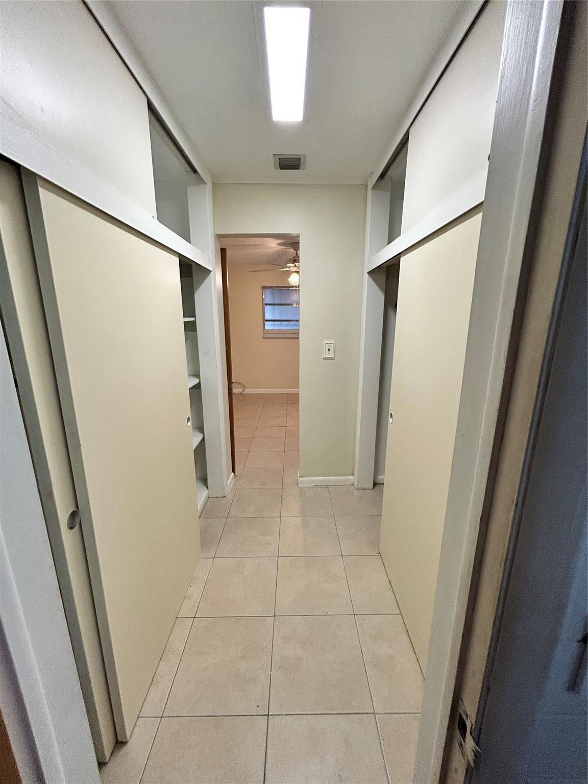 244 Southwest 3rd Place Dania Beach, FL 33004 - Photo 29 of 42 a view of entryway with white walls and refrigerator