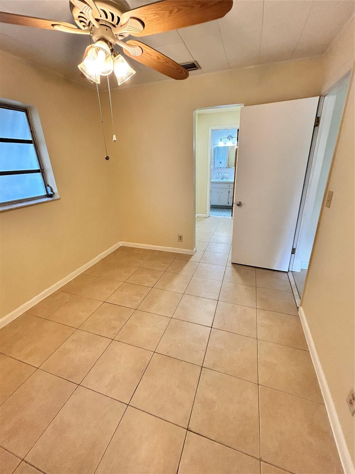 244 Southwest 3rd Place Dania Beach, FL 33004 - Photo 32 of 42 a view of an empty room with a window