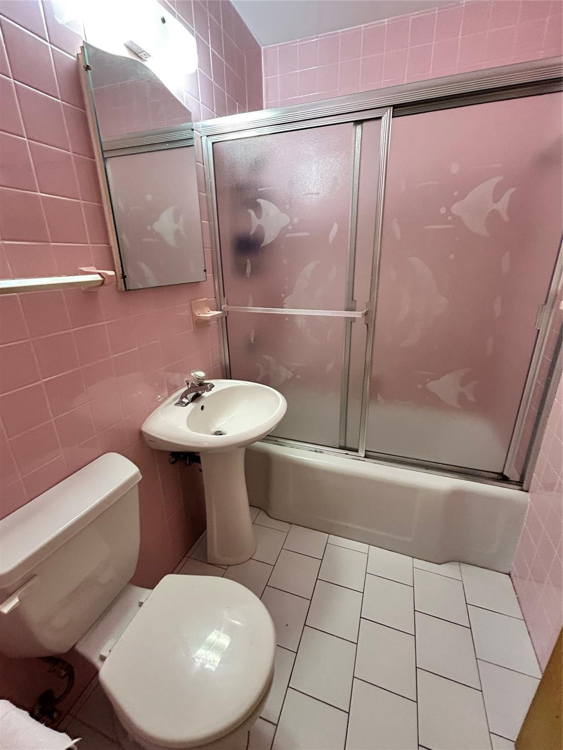 244 Southwest 3rd Place Dania Beach, FL 33004 - Photo 33 of 42 a bathroom with a sink toilet and shower