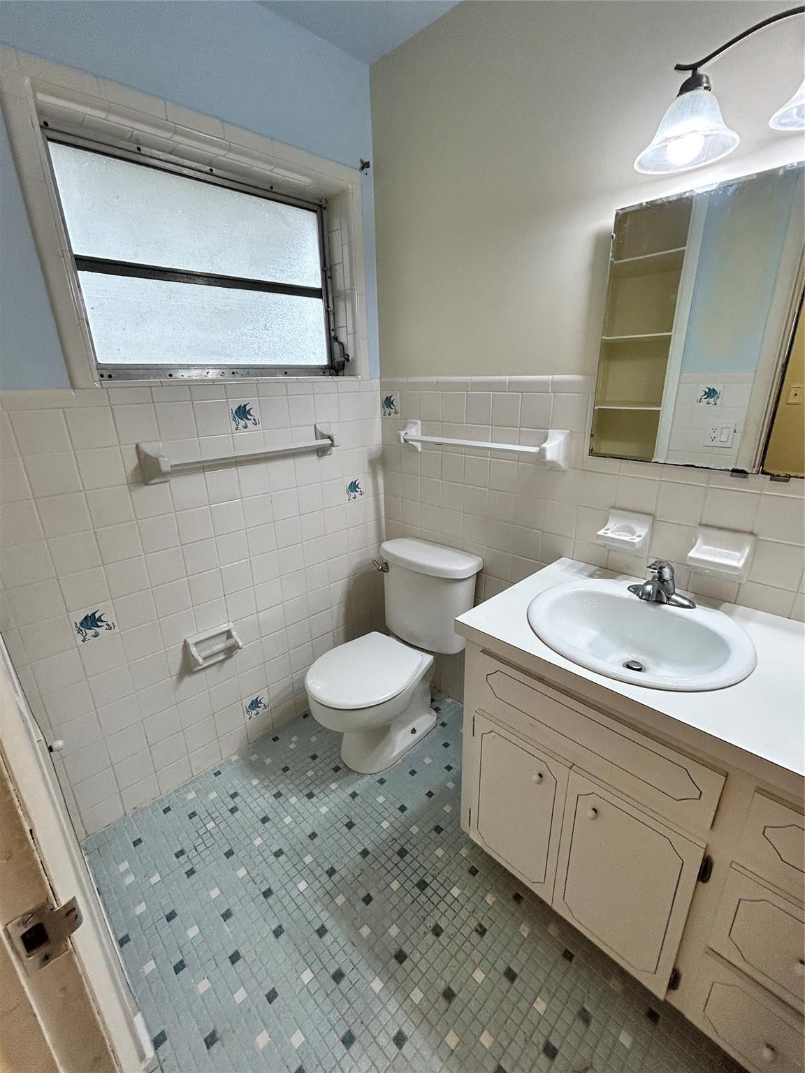 244 Southwest 3rd Place Dania Beach, FL 33004 - Photo 38 of 42 a bathroom with a sink a toilet and shower