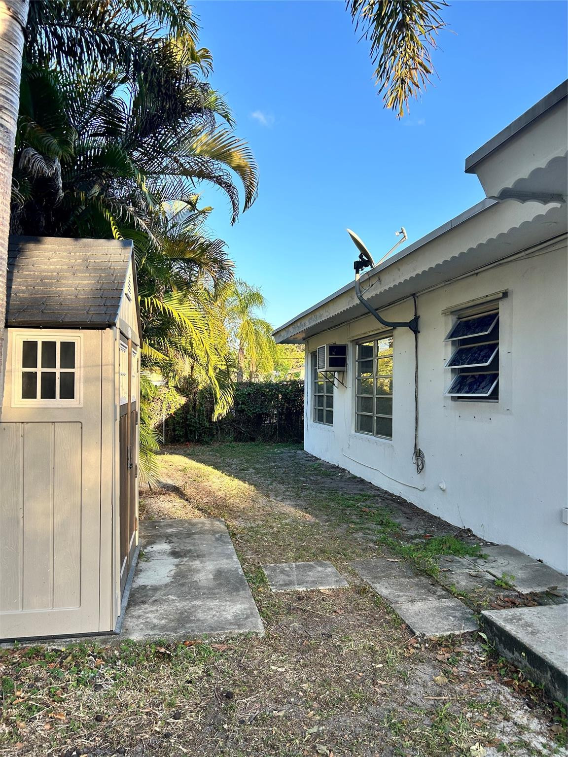 244 Southwest 3rd Place Dania Beach, FL 33004 - Photo 41 of 42 a front view of a house with garden