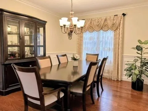 a kitchen with sink refrigerator and microwave
