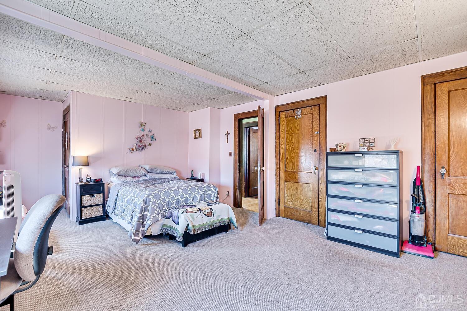 1690 Porter Road Union, NJ 07083 - Photo 18 of 28 a bedroom with a bed and a ceiling fan