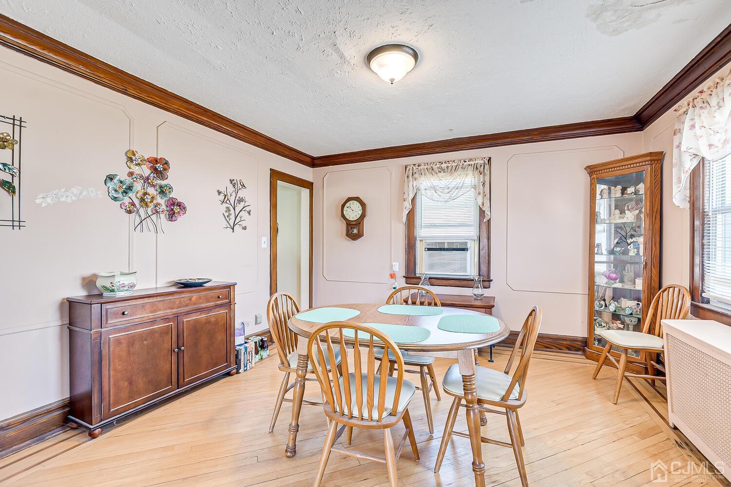 1690 Porter Road Union, NJ 07083 - Photo 9 of 28 a view of a dining room with furniture and chandelier