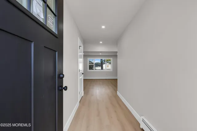 wooden floor in an empty room with a gallery
