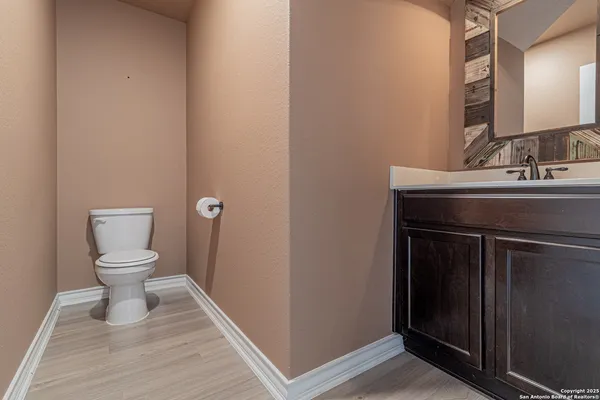 a bathroom with a sink and a toilet