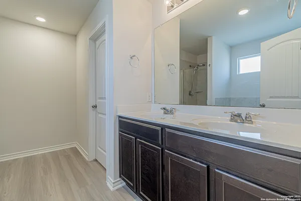 a bathroom with a bathtub and a sink