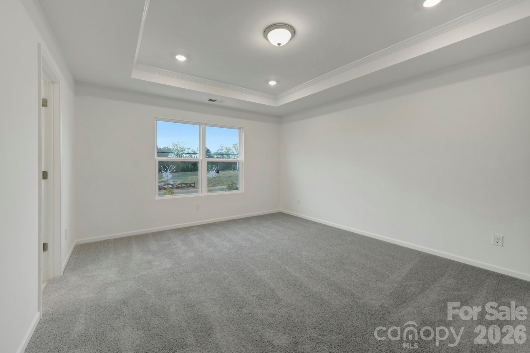 1138 Overbrook Place Wingate, NC 28174 - Photo 16 of 22 an empty room with windows