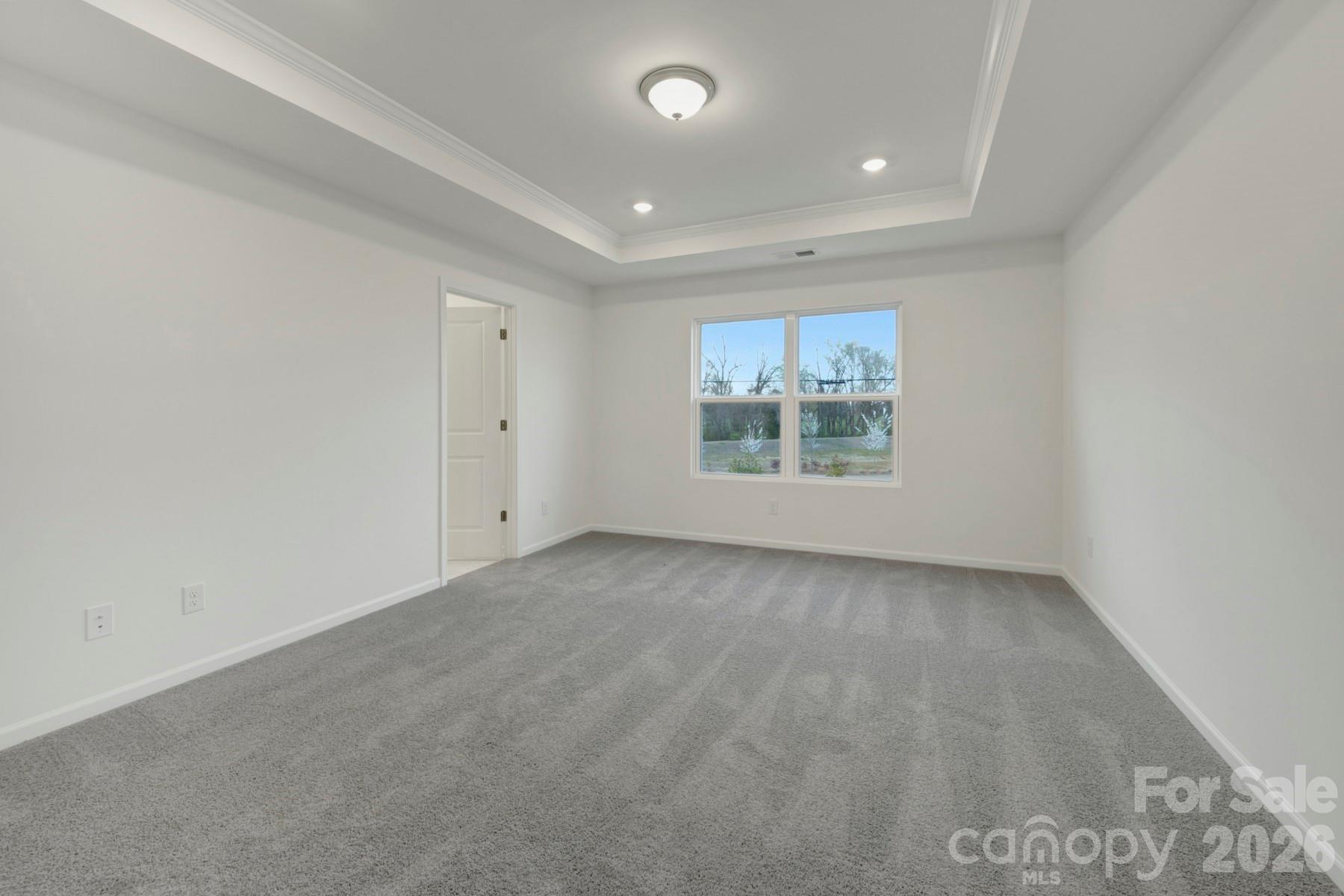 1138 Overbrook Place Wingate, NC 28174 - Photo 17 of 22 an empty room with a window