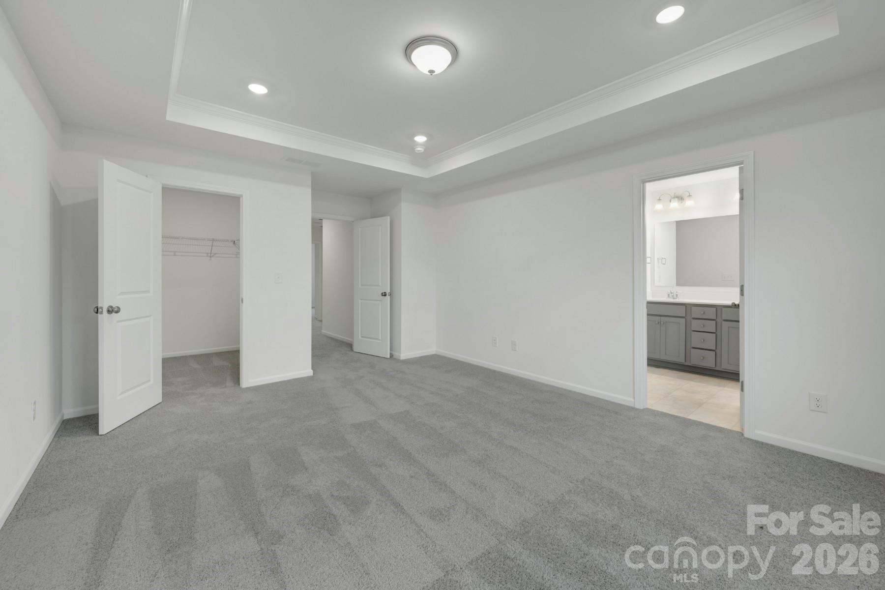 1138 Overbrook Place Wingate, NC 28174 - Photo 18 of 22 an empty room with closet and windows
