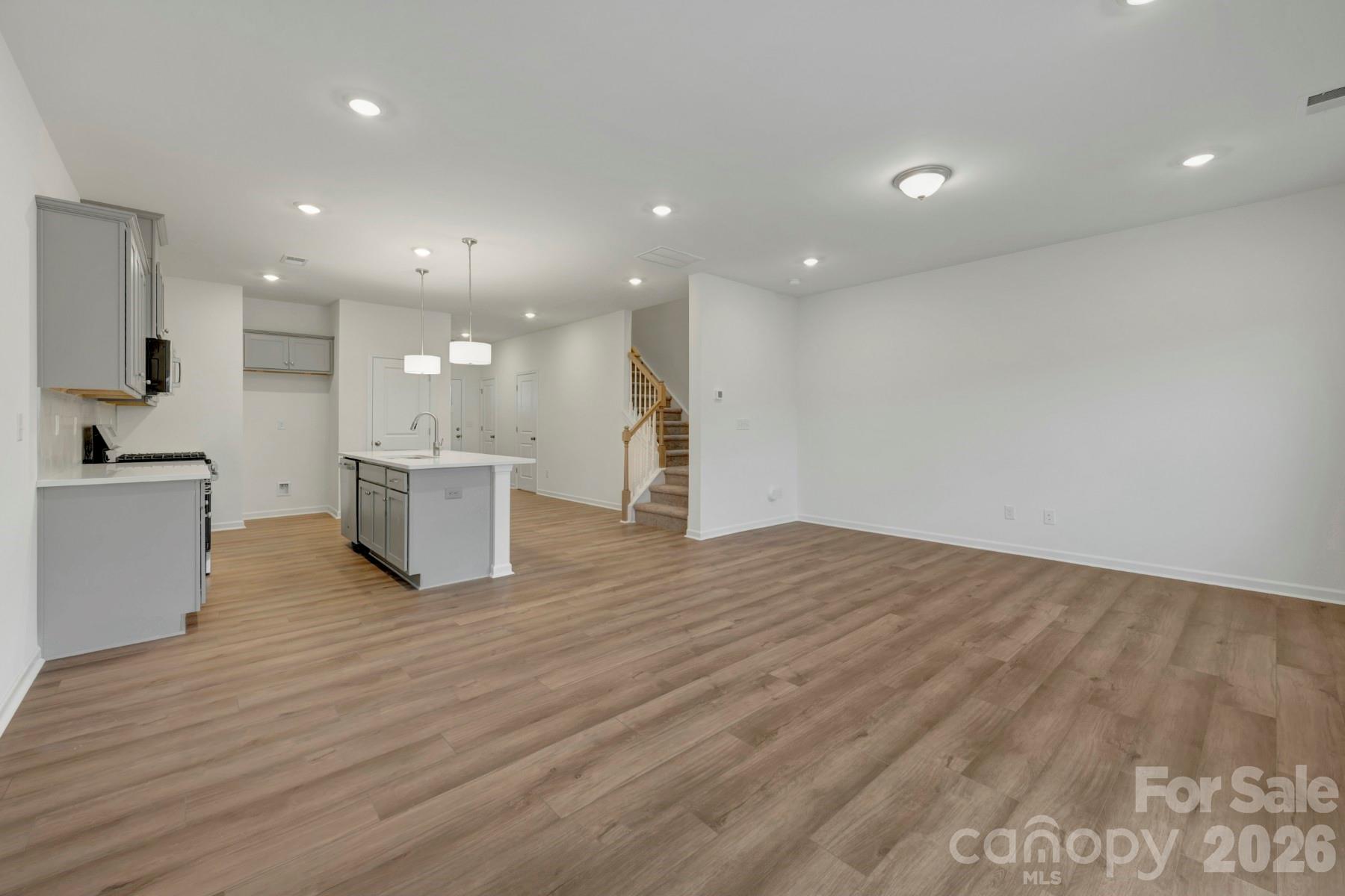 1138 Overbrook Place Wingate, NC 28174 - Photo 8 of 22 a view of kitchen with wooden floor