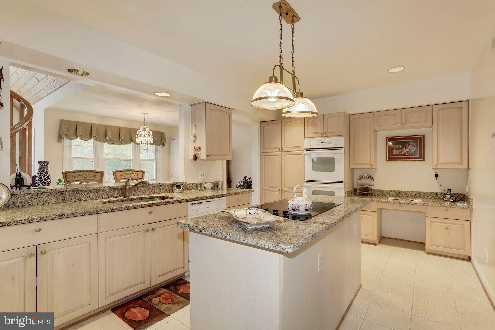 2001 Longmead Road Silver Spring, MD 20906 - Photo 7 of 30 Gourmet Kitchen w/ Cooktop, Granite Counters