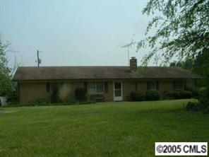 5403 Griffith Road Monroe, NC 28112 - Photo 3 of 3 a view of a house with a yard