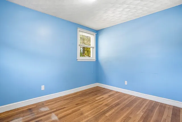 a kitchen with appliances a sink and cabinets