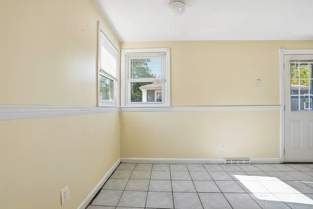 a kitchen with cabinets and appliances