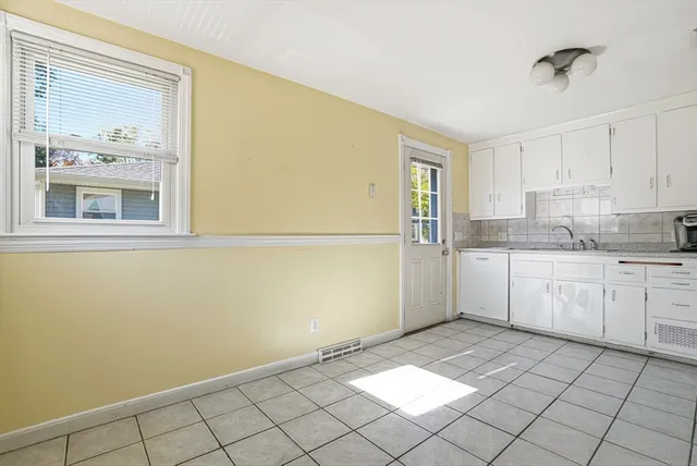 a view of a room that has a window in it