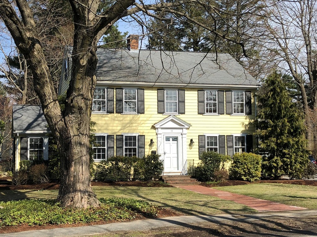 14 Pilgrim Road Wellesley, MA 02481 - Photo 1 of 20 a front view of a house with a yard