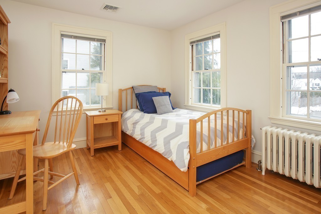 14 Pilgrim Road Wellesley, MA 02481 - Photo 15 of 20 a bedroom with a bed and a window