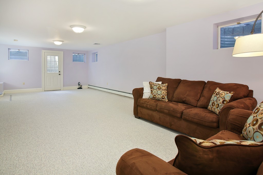 14 Pilgrim Road Wellesley, MA 02481 - Photo 18 of 20 a living room with furniture