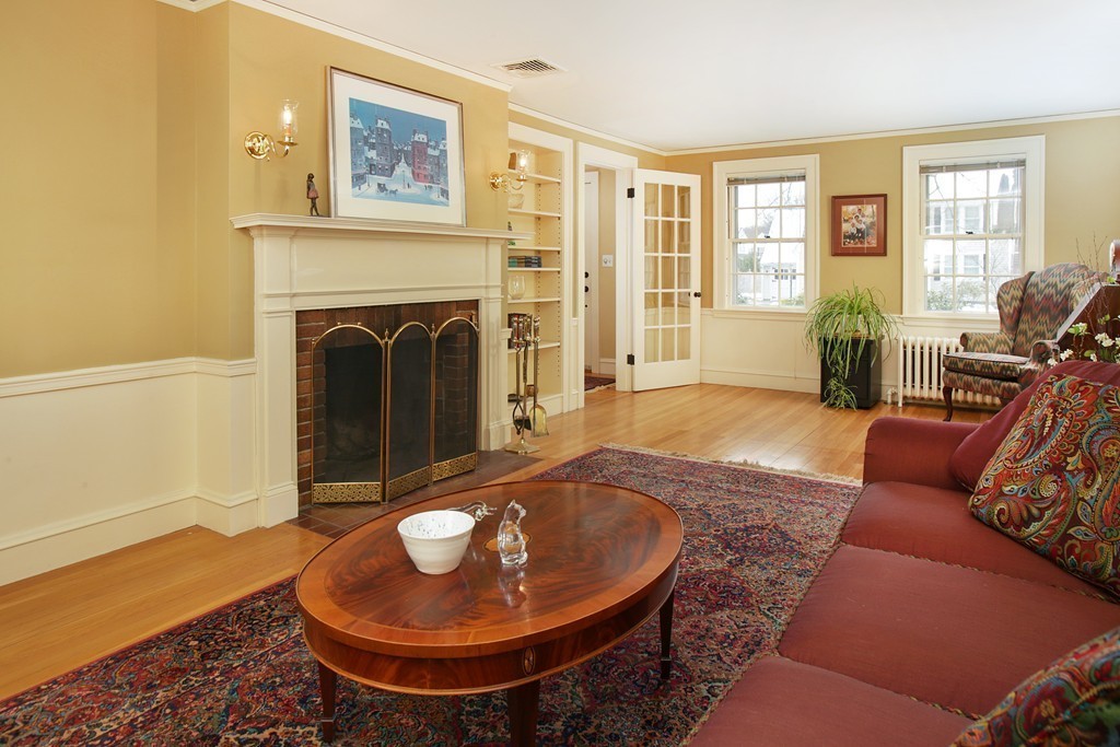 14 Pilgrim Road Wellesley, MA 02481 - Photo 3 of 20 a living room with furniture and a fireplace