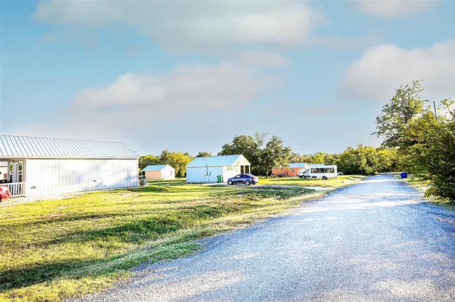 a front view of a house with swimming pool