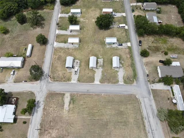 an aerial view of residential house with outdoor space