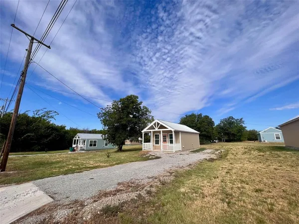 a view of house with outdoor space