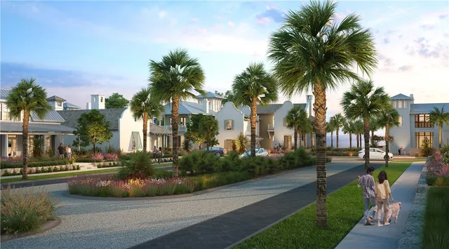 a view of a white house with a yard and palm trees