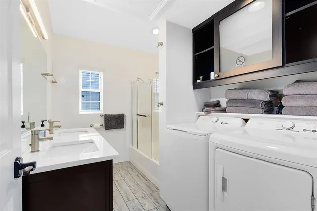 a utility room with dryer and washer