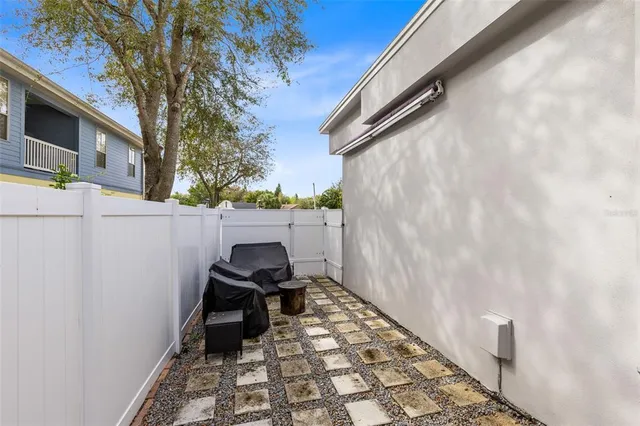 a view of a porch with furniture