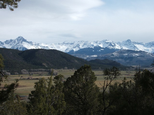 a view of a lake with mountains in the background