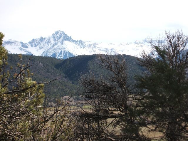 Lot 7 Promontories Drive Ridgway, CO 81432 - Photo 3 of 7 a view of a house with a mountain