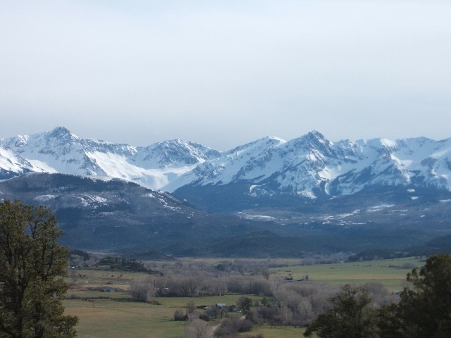 Lot 7 Promontories Drive Ridgway, CO 81432 - Photo 5 of 7 a view of a dry yard with mountains in the background