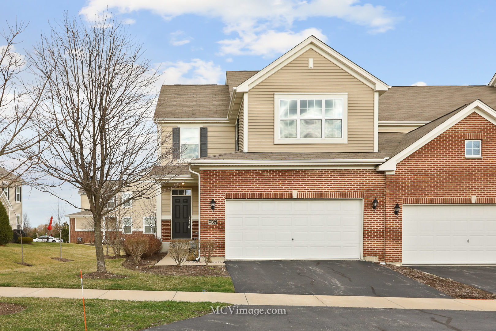 2959 Church Road Aurora, IL 60502 - Photo 3 of 36 a view of a house with a yard and garage
