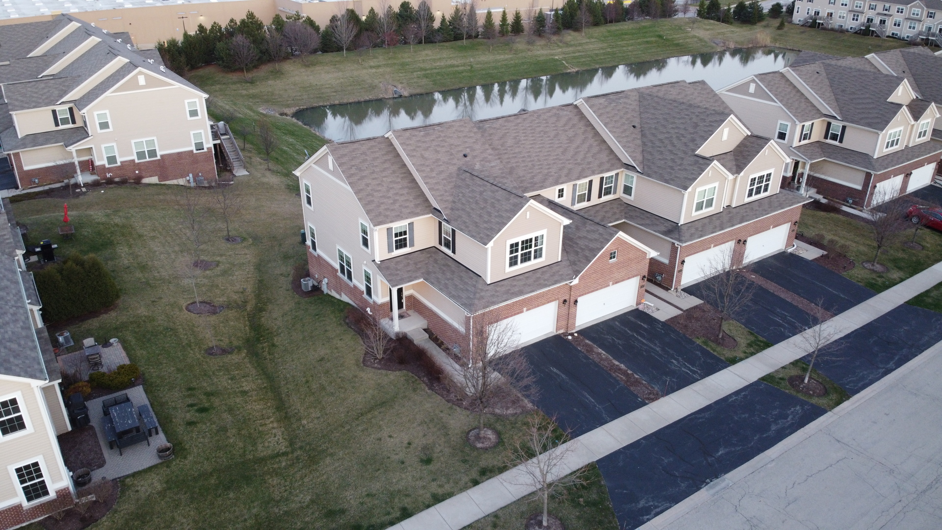 2959 Church Road Aurora, IL 60502 - Photo 4 of 36 an aerial view of a house with outdoor space and lake view