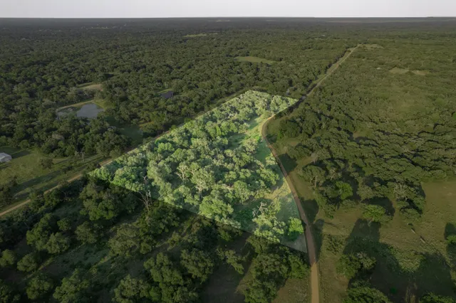a view of a yard with an outdoor space
