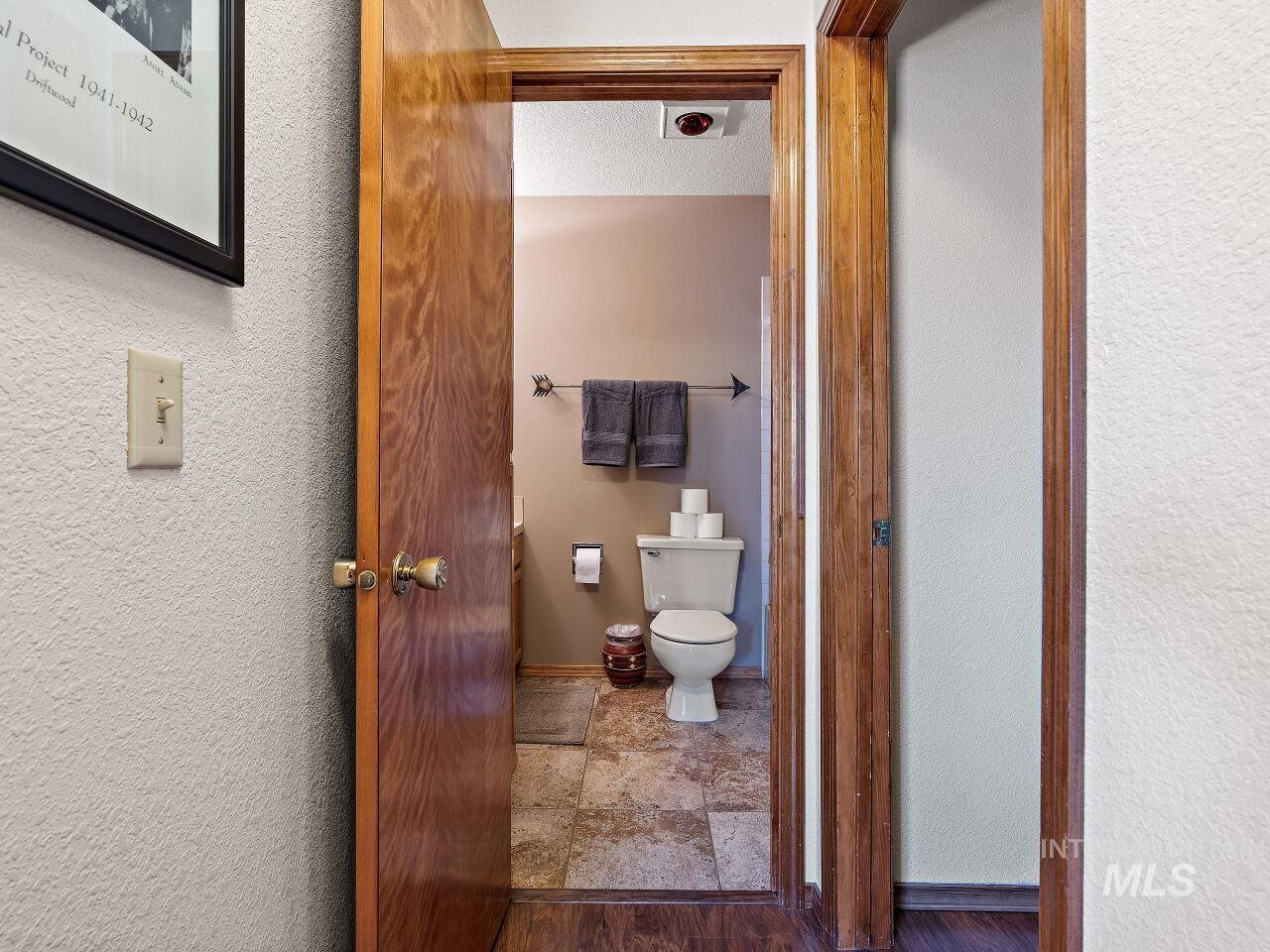 601 Hemlock Street, Unit 10 McCall, ID 83638 - Photo 28 of 43 Bathroom featuring toilet and stone finish floors