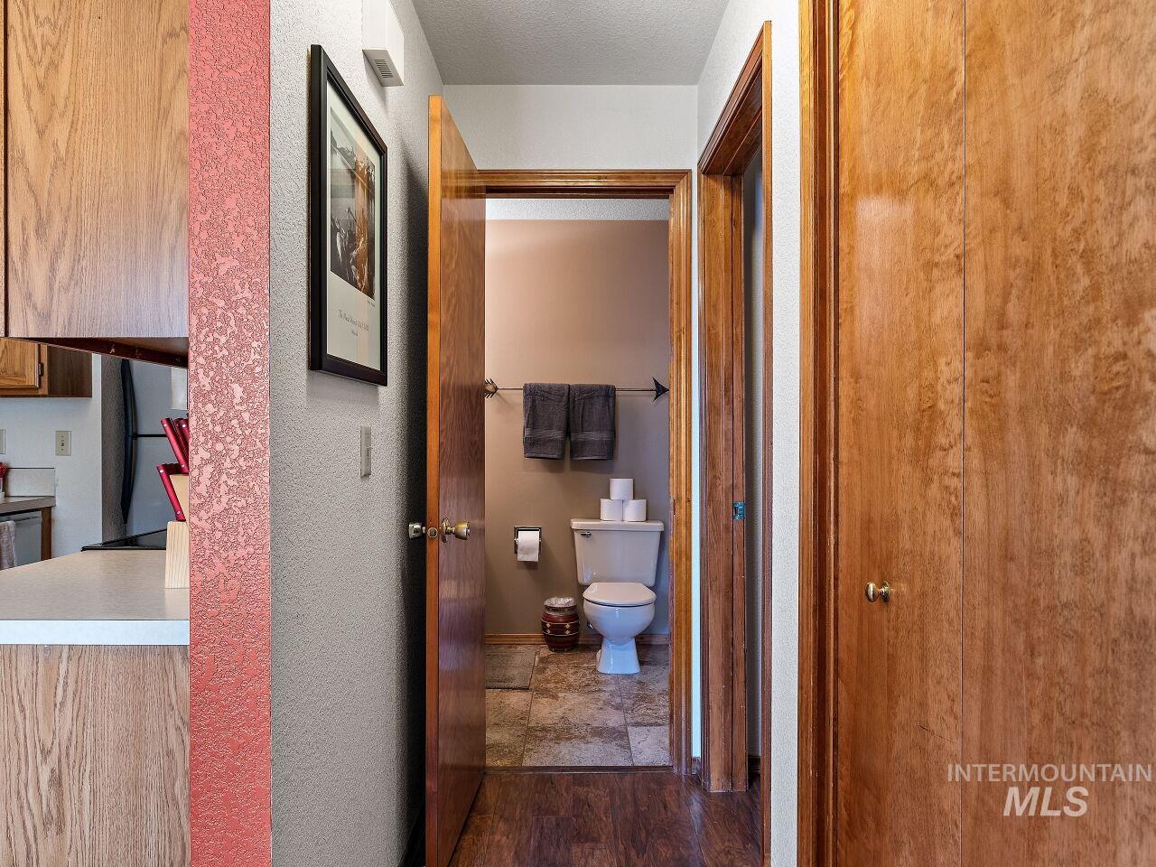 601 Hemlock Street, Unit 10 McCall, ID 83638 - Photo 36 of 43 Hall with dark wood-type flooring