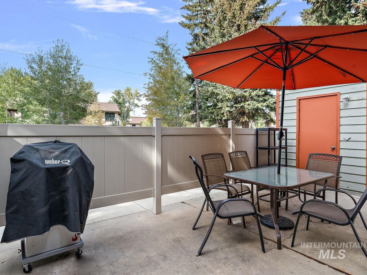 601 Hemlock Street, Unit 10 McCall, ID 83638 - Photo 42 of 43 View of patio / terrace featuring grilling area and outdoor dining area