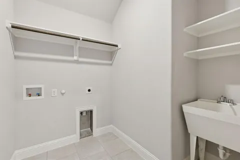 a bathroom with a sink and mirror