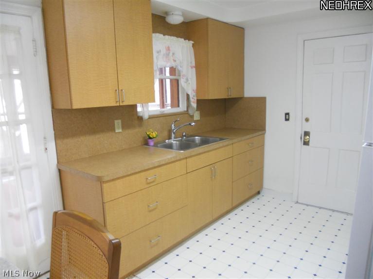 Updated eat-in Kitchen with new cabinets, counters and sink. All appliances stay.
