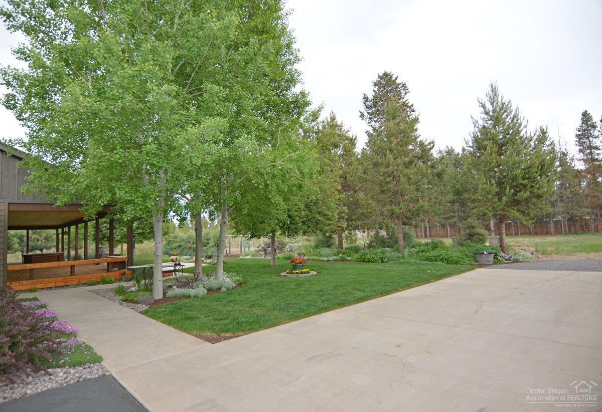 15885 Ranch Place La Pine, OR 97739 - Photo 10 of 25 View of backyard from between attached g